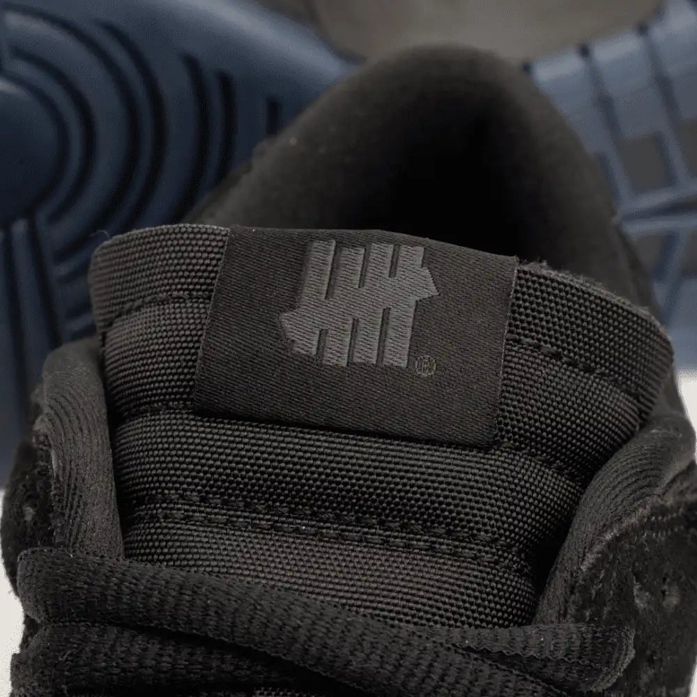 Undefeated x Nike Dunk Low 5 on It